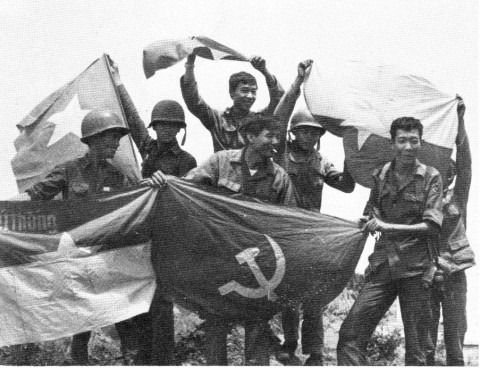 Vietnamese soldiers with flags